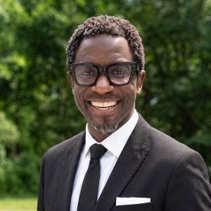 TK Primary Headshot Blk Suit Park